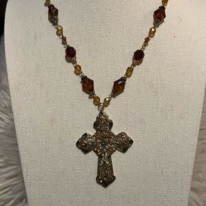 Elegant Gold and Garnet Cross Pendant Necklace